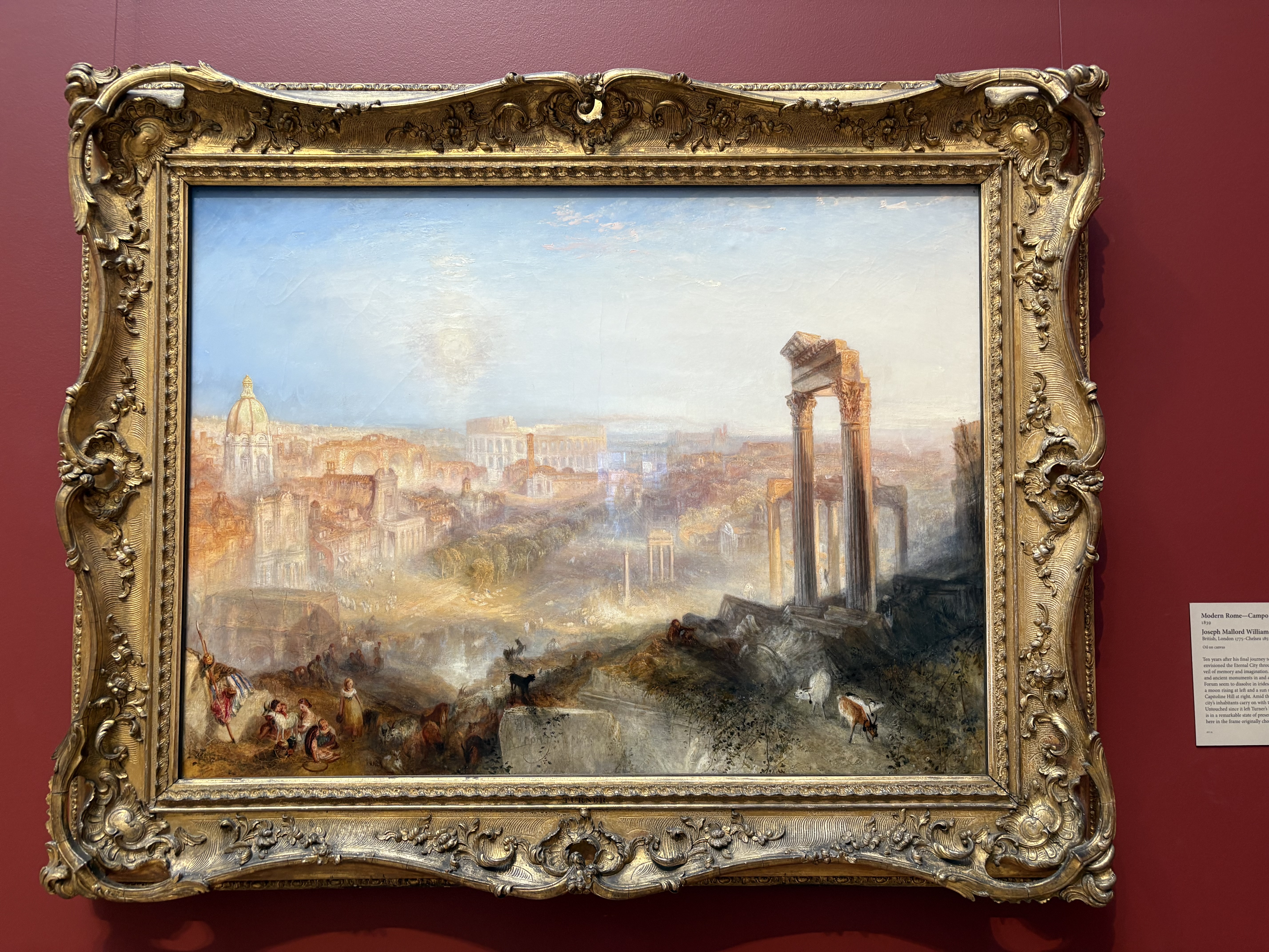 pictureofapaintingonaredwall